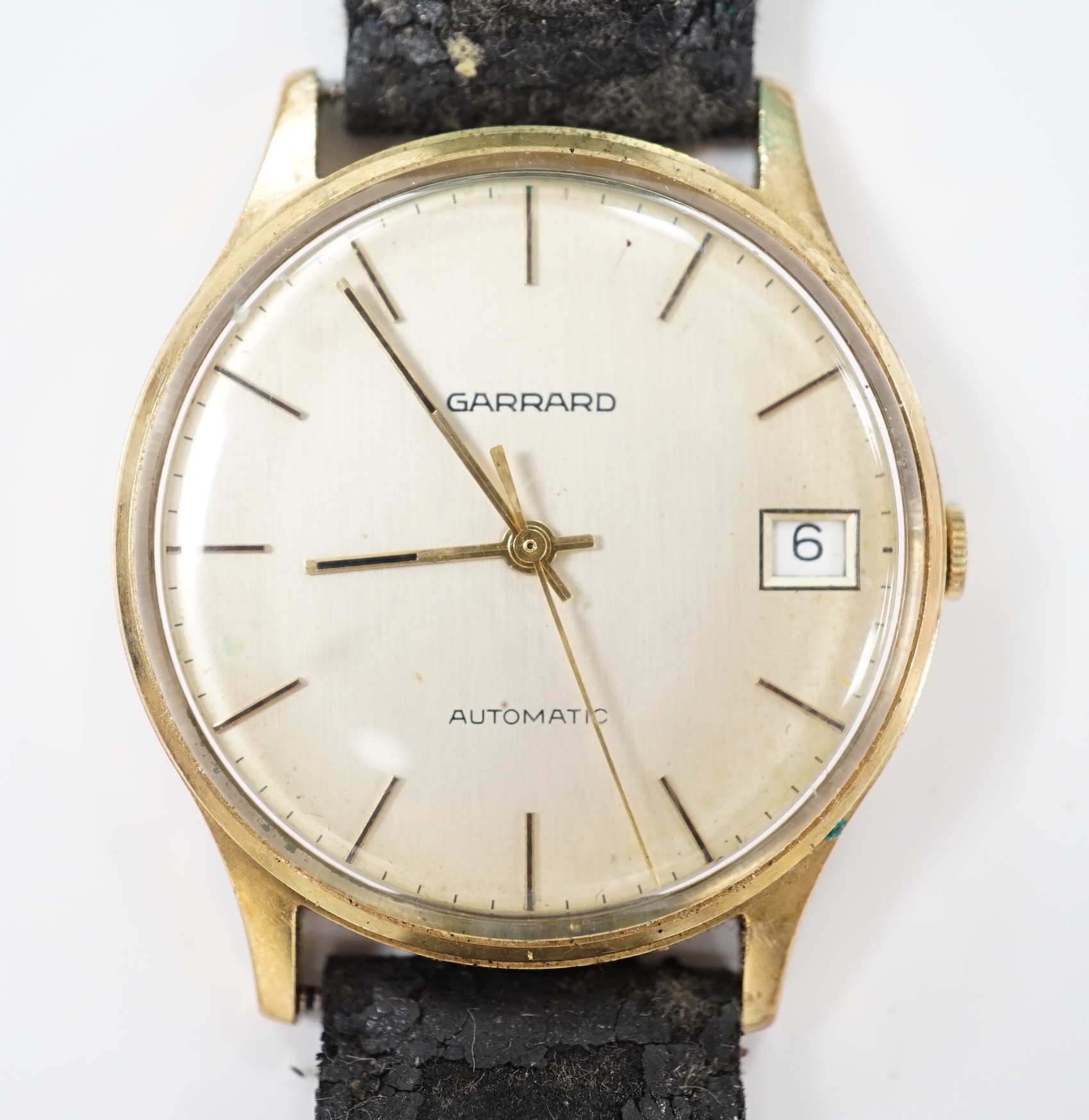 A gentleman's 1980's 9ct gold automatic wrist watch, retailed by Garrards